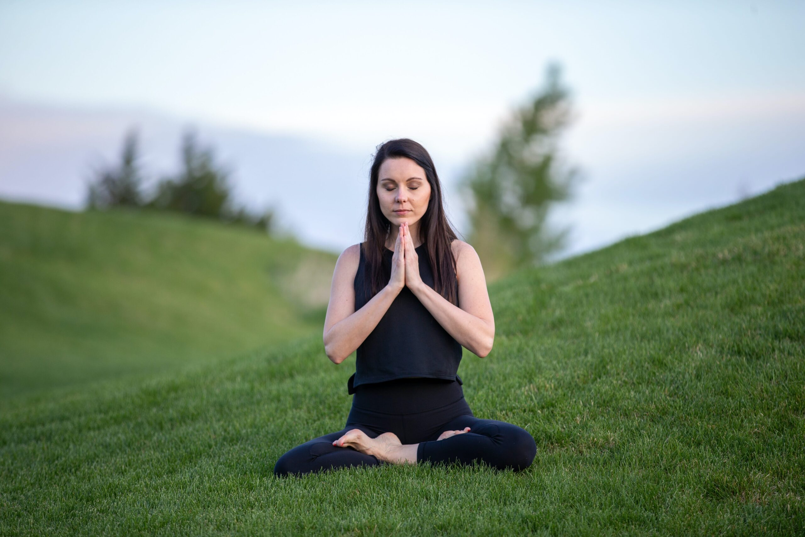 Meditating person focusing on deep breathing for mindfulness