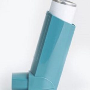 Person using an inhaler for icd-10 code for asthma treatment, managing symptoms and improving breathing.
