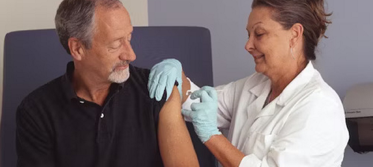 Man performing a self-check for prostate cancer at home