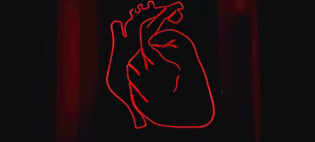 Illustration of a heart with a cancer ribbon, representing the rarity of heart cancer and its significance in the medical field.