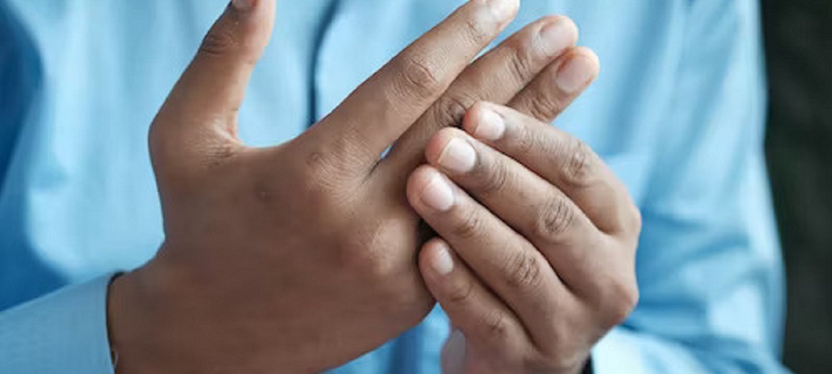 A glass of water with a teaspoon of baking soda dissolved in it, representing the use of baking soda for gout relief.