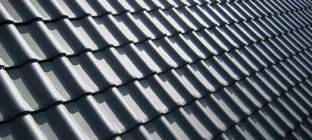 A stack of roofing shingle bundles with various types and sizes, showcasing the diversity in bundle quantities.