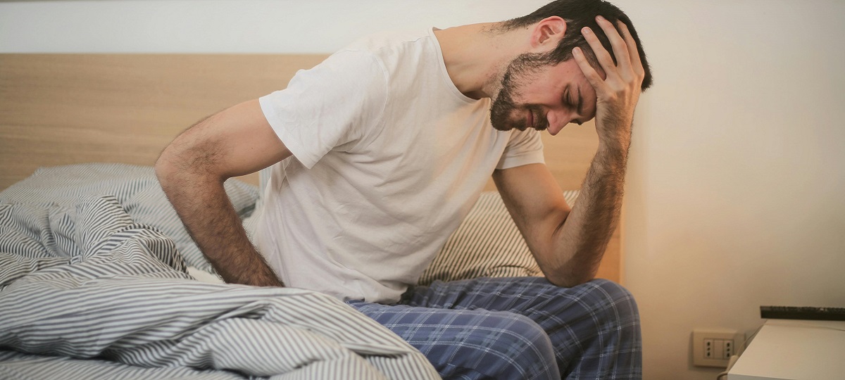 Person massaging their knee to relieve joint pain