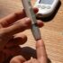 Pregnant woman monitoring blood sugar levels - Managing gestational diabetes with lifestyle changes and regular check-ups.