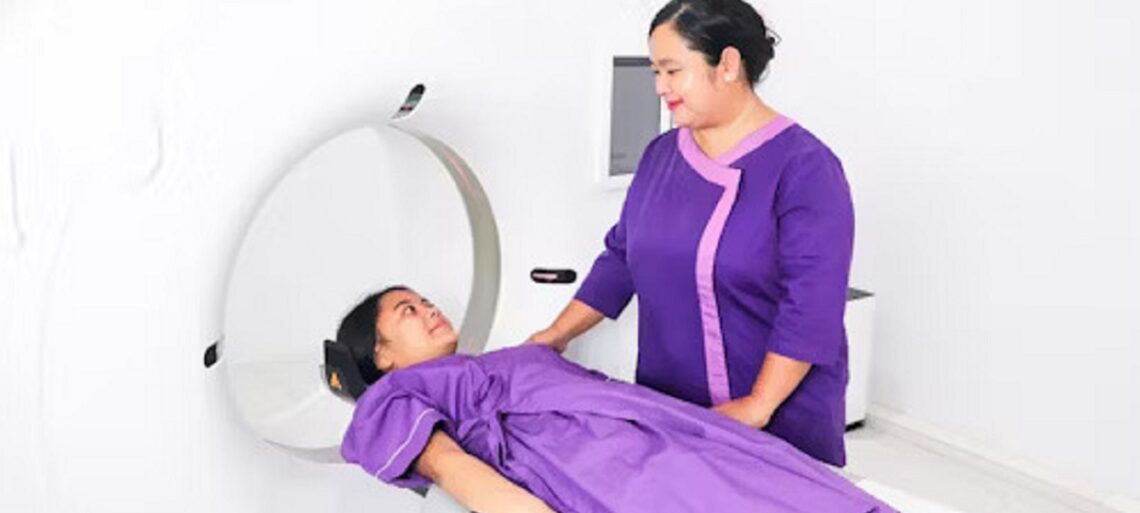 A person undergoing a HIDA scan procedure in a medical facility.