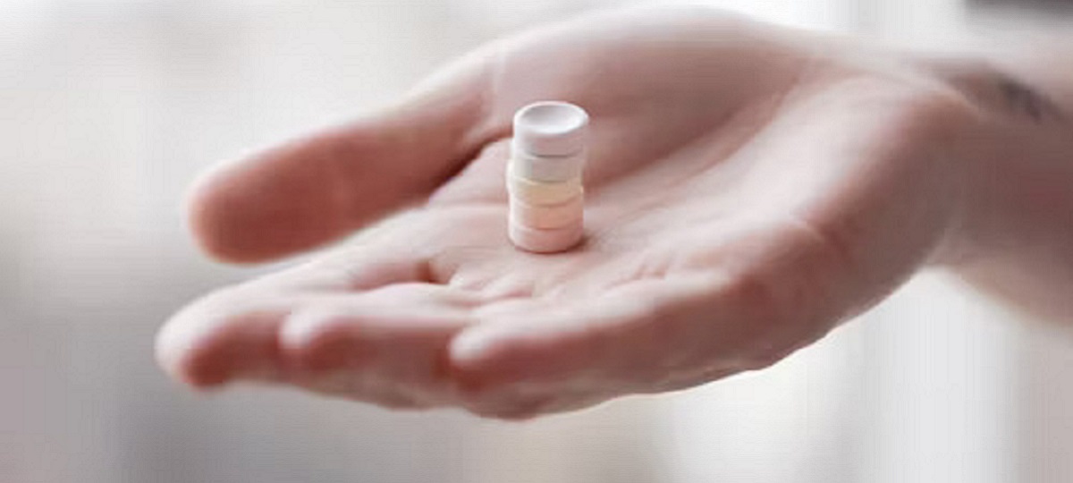 Prednisone tablets, used for treating gout, on a white background